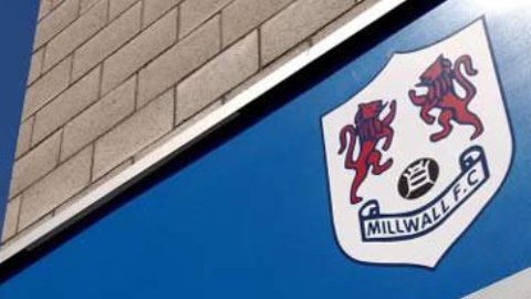 Millwall FC shield outside the New Den. 