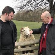 Mayor Biggs with Louie Legon and one of the sheep at Mudchute farm. 